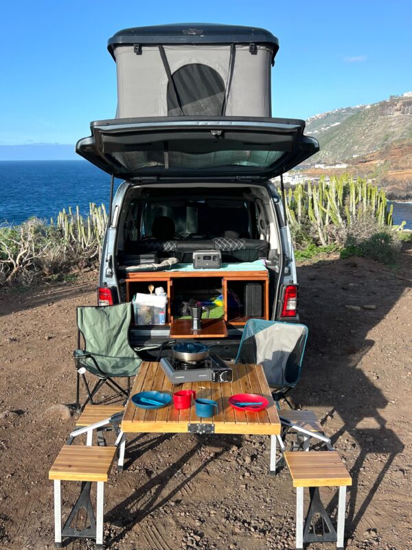 Campervan parked by Tenerife beach – rental for adventure travel
